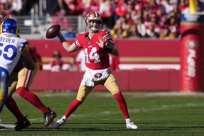 Jan 7, 2024; Santa Clara, California, USA; San Francisco 49ers quarterback Sam Darnold (14) throws a pass against the Los Angeles Rams during the first quarter at Levi's Stadium.